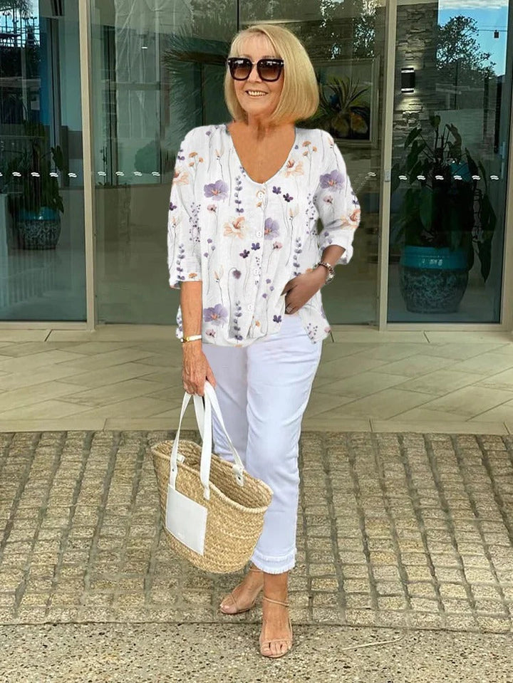 Teresa Camicetta floreale elegante con bottoni