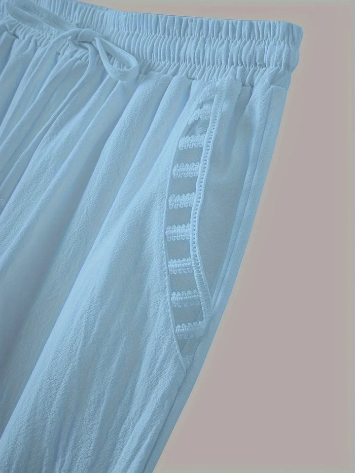 Pantaloni cropped Tracey con finiture a contrasto