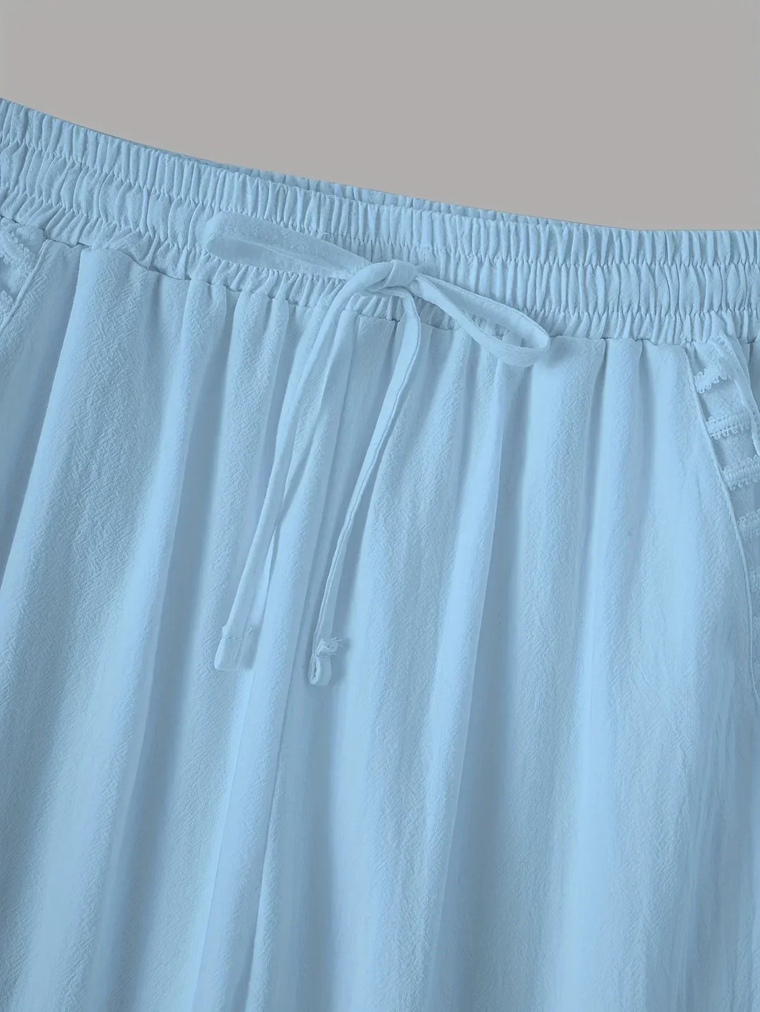 Pantaloni cropped Tracey con finiture a contrasto