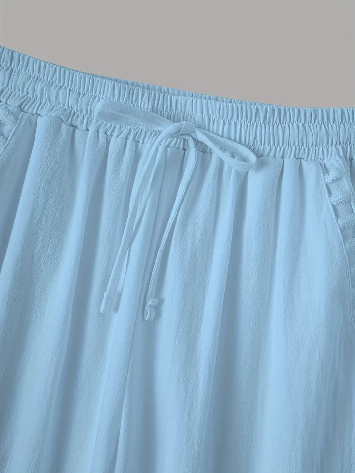 Pantaloni cropped Tracey con finiture a contrasto