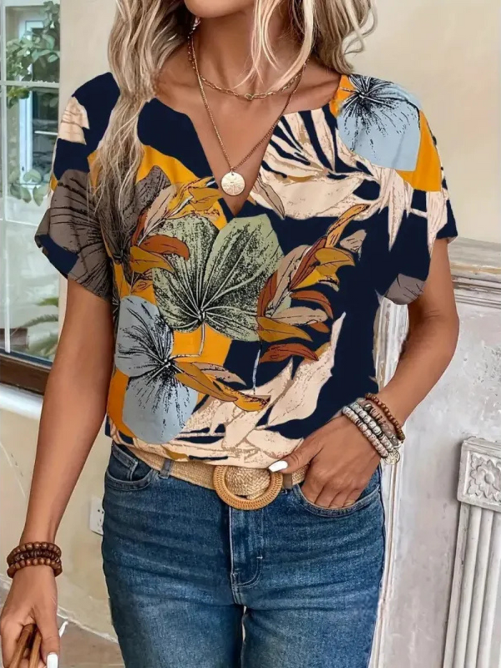 Camicetta Charis con bottoni floreali