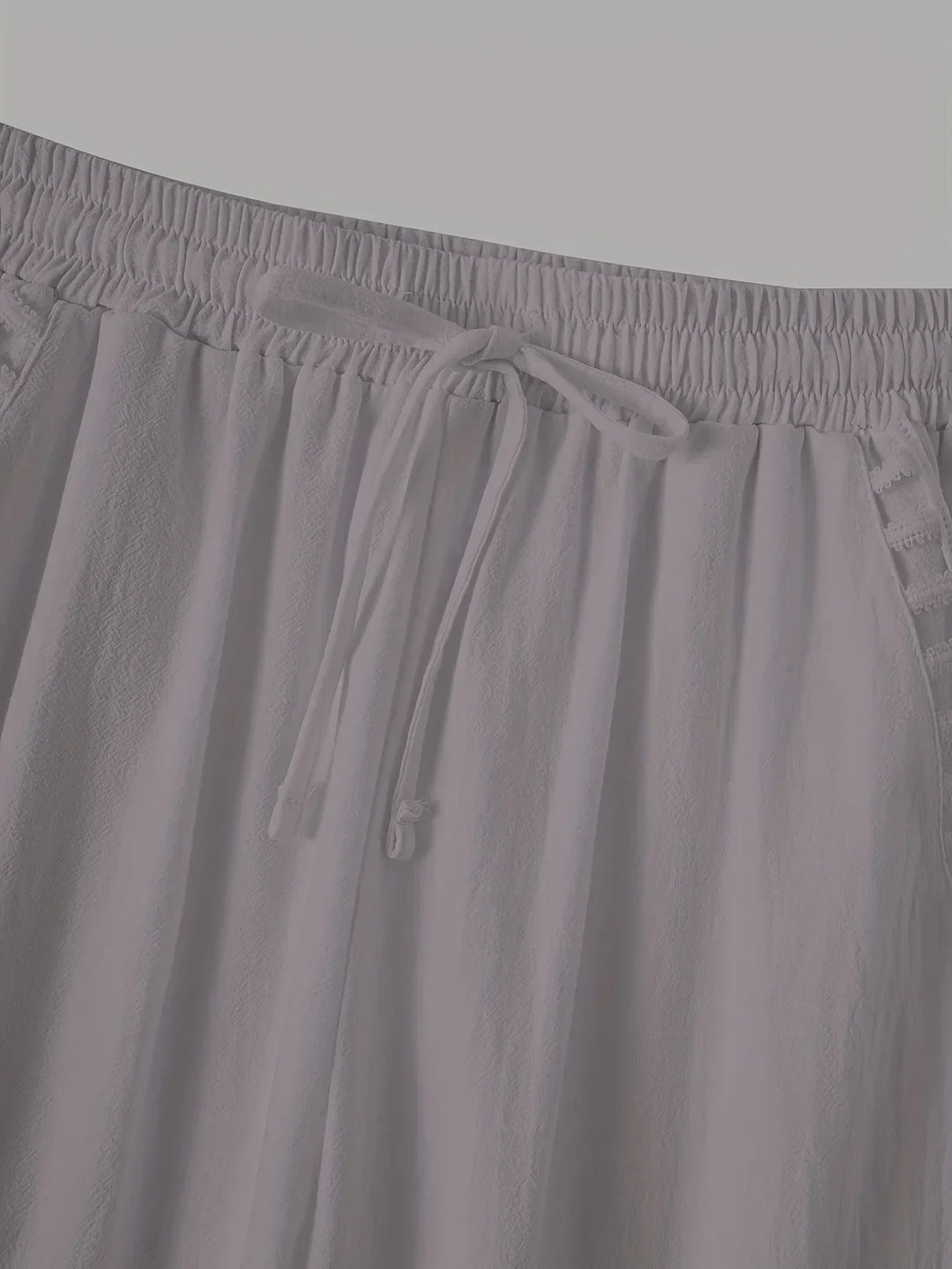 Pantaloni cropped Tracey con finiture a contrasto