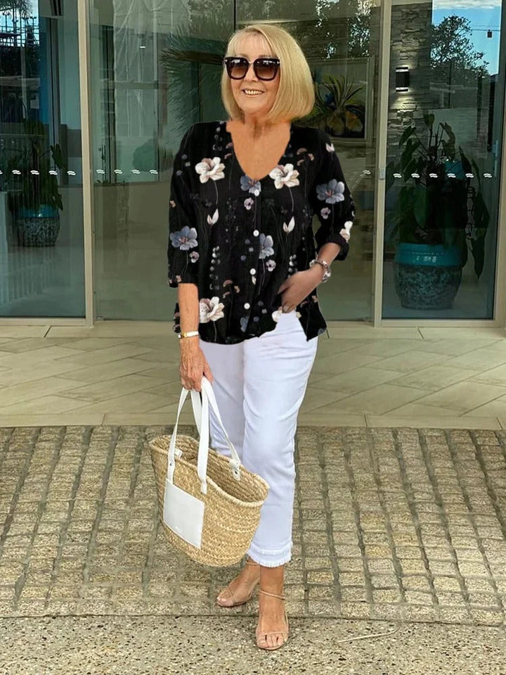 Teresa Camicetta floreale elegante con bottoni