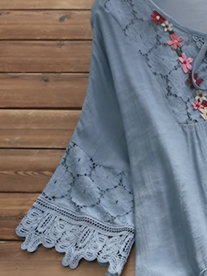 Camicetta elegante in pizzo patchwork con scollo a V