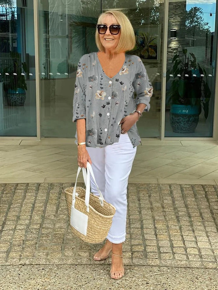 Teresa Camicetta floreale elegante con bottoni