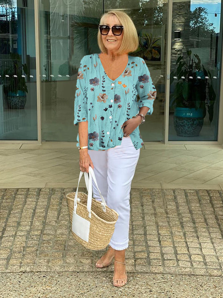 Teresa Camicetta floreale elegante con bottoni