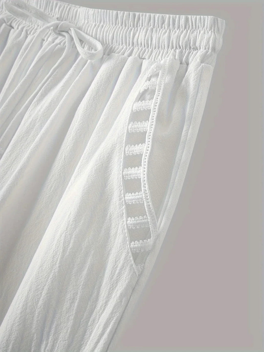 Pantaloni cropped Tracey con finiture a contrasto